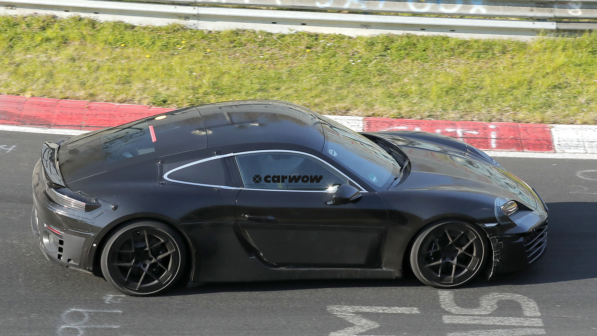 Porsche 718 Cayman Electric on test drive 2025 side view